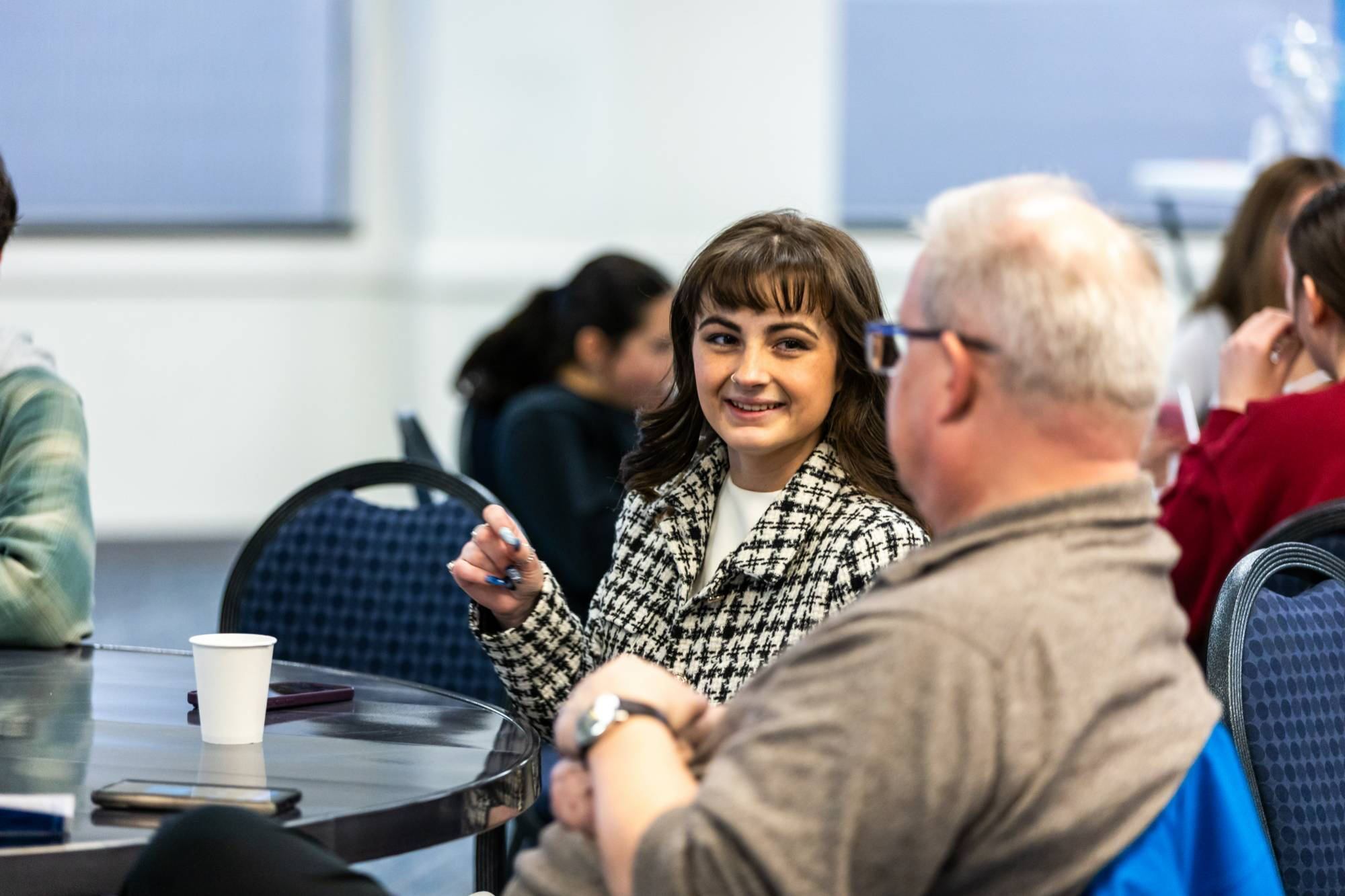 Student chatting with a faculty member